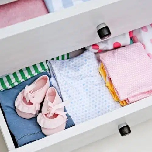 Neatly folded laundry arranged in a drawer